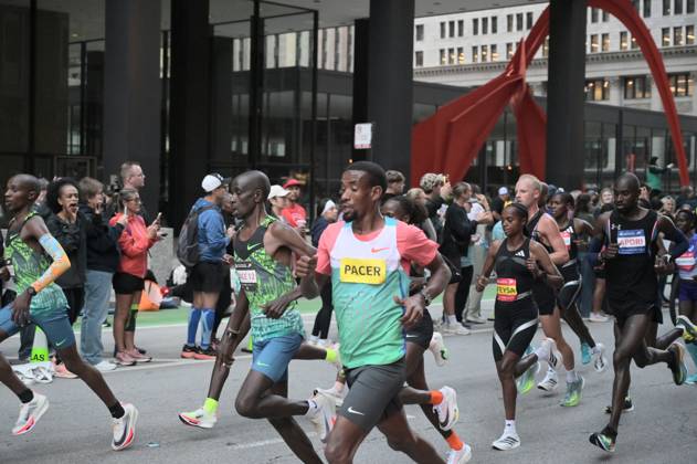 Chicago Marathon 2026 CHICAGO, ILLINOIS - OCTOBER 11: A pack of runners competes during the 48th Bank of America Chicago Marathon on Dearborn Street in the Loop, near the Alexander Calder s Flamingo sculpture at Federal Plaza on October 11, 2026 in Chicago, Illinois. The 26.2-mile race started and finished in Grant Park, winding through 29 neighborhoods with over 55,000 participants. Jacek Boczarski Anadolu Chicago United States. Editorial use only. Please get in touch for any other usage.  Copyright: x2026xAnadoluxJacekxBoczarskix