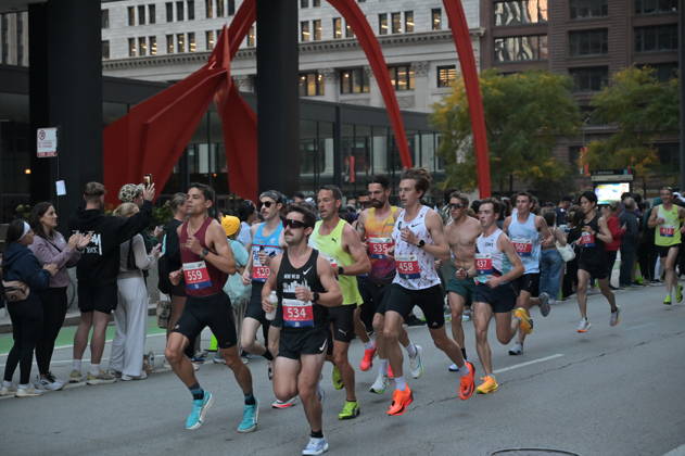 Chicago Marathon 2026 CHICAGO, ILLINOIS - OCTOBER 11: A pack of runners competes during the 48th Bank of America Chicago Marathon on Dearborn Street in the Loop, near the Alexander Calder s Flamingo sculpture at Federal Plaza on October 11, 2026 in Chicago, Illinois. The 26.2-mile race started and finished in Grant Park, winding through 29 neighborhoods with over 55,000 participants. Jacek Boczarski Anadolu Chicago United States. Editorial use only. Please get in touch for any other usage.  Copyright: x2026xAnadoluxJacekxBoczarskix