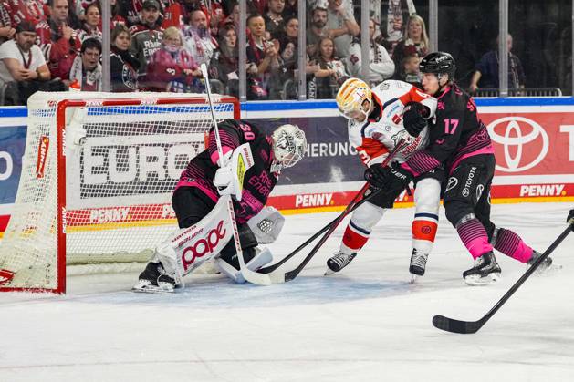 Ice Hockey: Penny DEL, Matchday 8—Cologne Sharks vs. Nuremberg Ice Tigers on October 11, 2026, at the Lanxess Arena in Cologne. Janne Juvonen (Cologne), left: Greg Meireles (Nuremberg), center: Jan Luca Sennhenn (Cologne), right: In accordance with the regulations of the DEL (German Ice Hockey League), the publication and further use of the footage in electronic media and on devices of any kind during the game is not permitted. xDMx