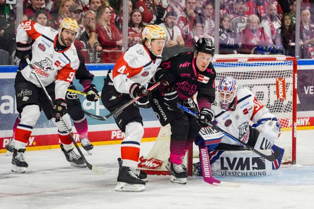 Ice Hockey: Penny DEL, Matchday 8—Cologne Sharks vs. Nuremberg Ice Tigers on October 11, 2026, at the Lanxess Arena in Cologne. From left to right: Constantin Braun (Nuremberg), Owen Headrick (Nuremberg), Juhani Tyrväinen (Cologne), Niklas Treutle (Nuremberg). In accordance with the regulations of the DEL (German Ice Hockey League), the publication and further use of these images in electronic media and on devices of any kind during the game is not permitted. xDMx