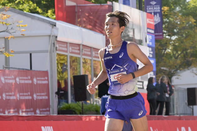 Tomoki Ota of Japan crosses the finish line with a time of 02:11:52 placing 26th over all placing during 2026 Bank of America Chicago Marathon in Chicago on Sunday, Oct. 11, 2026. CHI20261011113 MARKxBLACK