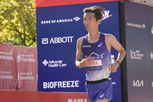 Tomoki Ota of Japan crosses the finish line with a time of 02:11:52 placing 26th over all placing during 2026 Bank of America Chicago Marathon in Chicago on Sunday, Oct. 11, 2026. CHI20261011115 MARKxBLACK
