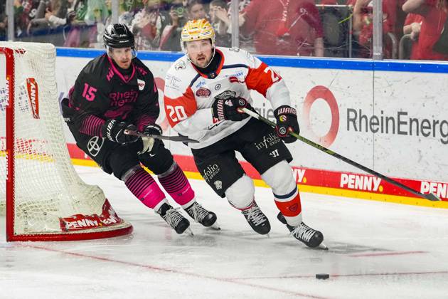 Ice Hockey: Penny DEL, Matchday 8—Cologne Sharks vs. Nuremberg Ice Tigers on October 11, 2026, at the Lanxess Arena in Cologne. Louis Marc Aubry (Cologne), left: Ryan Jones (Nuremberg), right: In accordance with the regulations of the DEL (German Ice Hockey League), the publication and further use of the footage in electronic media and on devices of any kind during the game is not permitted. xDMx