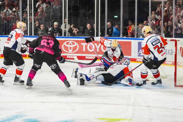 Ice Hockey: Penny DEL, Matchday 8—Cologne Sharks vs. Nuremberg Ice Tigers on October 11, 2026, at the Lanxess Arena in Cologne. Niklas Treutle (Nuremberg), center, buries the puck under him. According to the regulations of the DEL (German Ice Hockey League), the publication and further use of the footage in electronic media and on devices of any kind during the game is not permitted. xDMx