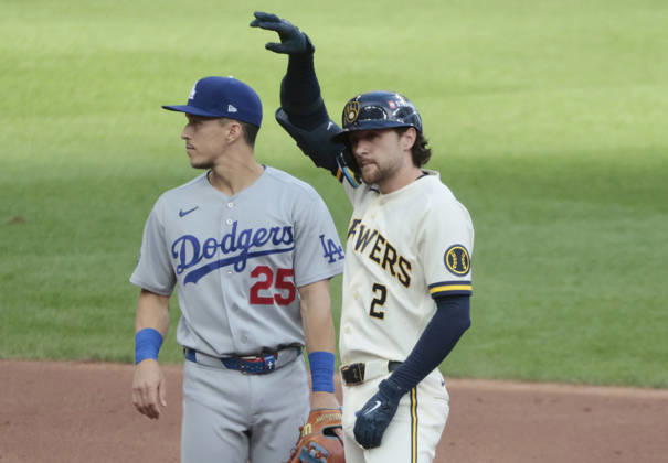 Milwaukee Brewers Brice Turang (2) stands on second base after hitting a double against the Los Angeles Dodgers in the first inning in game two of the MLB, Baseball Herren, USA National League Championship Series at American Family Field in Milwaukee, Wisconsin, on Monday, October 12, 2026.  MIL20261012706 TANNENxMAURY