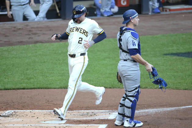 Milwaukee Brewers Brice Turang (2) scores on an rbi-single by William Contreras against the Los Angeles Dodgers in the first inning in game two of the MLB, Baseball Herren, USA National League Championship Series at American Family Field in Milwaukee, Wisconsin, on Monday, October 12, 2026.  MIL20261012708 TANNENxMAURY