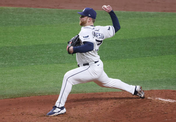 Tampa Bay Rays pitcher Drew Rasmussen (57) throws against the Cleveland Guardians in the third inning in game one of the MLB, Baseball Herren, USA American League Championship Series playoff at Raymond James Stadium in Tampa, Florida, on Monday, October 12, 2026.  TPB20261012707 GARYxBOGDON