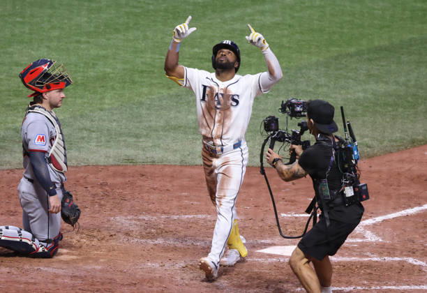 Tampa Bay Rays Cedric Mullins (31) celebrates after hitting a solo home run against the Cleveland Guardians in the eighth inning in game one of the MLB, Baseball Herren, USA American League Championship Series playoff at Raymond James Stadium in Tampa, Florida, on Monday, October 12, 2026.  TPB20261012714 GARYxBOGDON