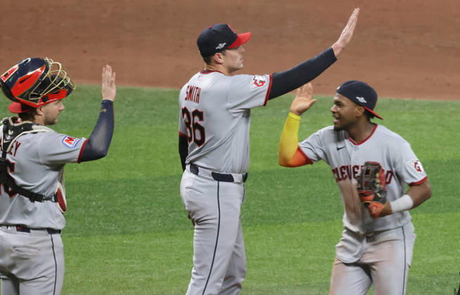 Cleveland Guardians players celebrate after the Guardians defeated the Tampa Bay Rays 7-3 in game one of the MLB, Baseball Herren, USA American League Championship Series playoff at Raymond James Stadium in Tampa, Florida, on Monday, October 12, 2026.  TPB202610127120 GARYxBOGDON