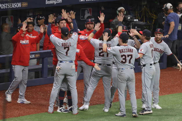 Cleveland Guardians players celebrate after the Guardians defeated the Tampa Bay Rays 7-3 in game one of the MLB, Baseball Herren, USA American League Championship Series playoff at Raymond James Stadium in Tampa, Florida, on Monday, October 12, 2026.  TPB20261012719 GARYxBOGDON