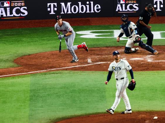 October 12, 2026, St. Petersburg, Florida, USA: Tampa Bay Rays starting pitcher Drew Rasmussen (57) and catcher Nick Fortes (40) lok on as Cleveland Guardians right fielder Chase DeLauter (24) watches as he begins to run the bases after hitting a solo home run in the sixth inning during the American League Championship Series game 1 at Tropicana Field on Monday, Oct. 12, 2026 in St. Petersburg. St. Petersburg USA - ZUMAs70_ 0869263071st Copyright: xDirkxShaddx