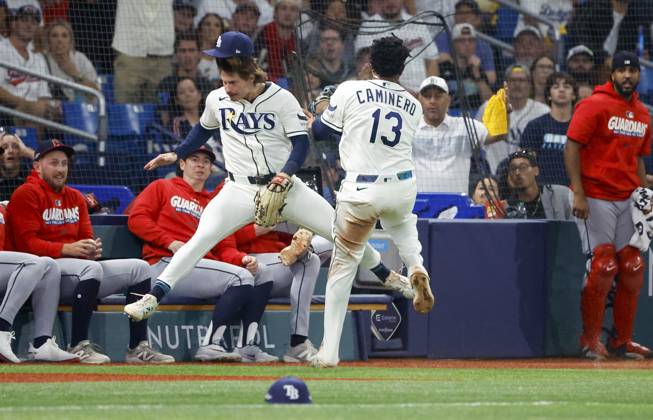 October 12, 2026, St. Petersburg, Florida, USA: Tampa Bay Rays right fielder Jonny DeLuca (21) collides with Tampa Bay Rays third baseman Junior Caminero (13) while attempting to catch a foul ball during the ninth inning of Game 1 of the American League Championship Series between the Tampa Bay Rays and the gainst the Cleveland Guardians on Monday, Oct. 12, 2026, at Tropicana Field in St. Petersburg. St. Petersburg USA - ZUMAs70_ 0869264114st Copyright: xJeffereexWoox