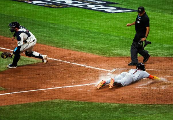 October 12, 2026, St. Petersburg, Florida, USA: Tampa Bay Rays catcher Liam Hicks (34) prepares to catch the ball as Cleveland Guardians Angel MartoÂ­nez (1) slides single by third baseman Joso RamoÂ­rez (11) in the ninth inning during the American League Championship Series game 1 at Tropicana Field on Monday, Oct. 12, 2026 in St. Petersburg. St. Petersburg USA - ZUMAs70_ 0869264529st Copyright: xDirkxShaddx