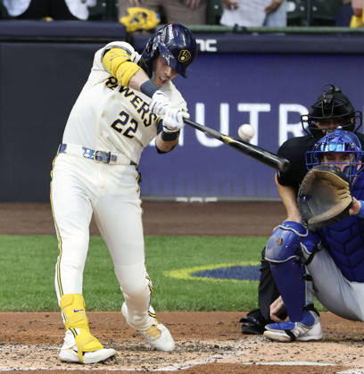 Baseball: Championship Series between Dodgers and Brewers Milwaukee Brewers designated hitter Christian Yelich hits a two-run single in the third inning of Game 2 of the National League Championship Series against the Los Angeles Dodgers at American Family Field in Milwaukee, Wisconsin, on Oct. 12, 2026.  A14AA0005630705P