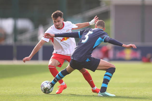RB Leipzig U19 vs. PSV Eindhoven U19, UEFA Youth League, Leipzig, October 13, 2026, Cottaweg Training Center, Soccer, 2026–2027 Season, U19 Juniors, UEFA Youth League, Matchday 2, RB Leipzig U19 vs. PSV Eindhoven U19 1–6 (1–1), Pictured from left: Din Klapija (21), RB, and Dyran Stam (5), Eindhoven. For editorial use only. UEFA regulations prohibit any use of photographs as image sequences and or quasi-video.