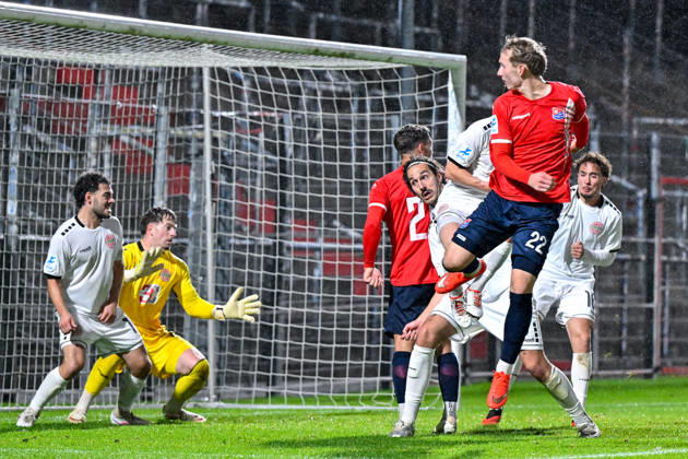 Cornelius Pfeiffer, Unterhaching, 22, scores the goal to make it 2–0; from left: Maximilian Holdenrieder, Landsberg, 14; Maurice Merkl, goalkeeper, Landsberg, 22; Cornelius Pfeiffer, Unterhaching, 22; 13, 10, 2026, Unterhaching, Germany, Soccer, Bavarian Regional League, SpVgg Unterhaching vs. TSV 1882 Landsberg xslx