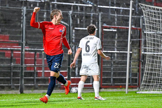 Goal scorer Cornelius Pfeiffer of Unterhaching, age 22, celebrating a goal, celebration, goal celebration, scoring a goal, celebrating the goal, goal, celebration, celebrating the goal that made it 2-0, optimistic, action, Lukas Bettrich of Landsberg, 6, looking disappointed, disappointment, frustration, pessimistic, October 13, 2026, Unterhaching, Germany, soccer, Bavarian Regional League, SpVgg Unterhaching vs. TSV 1882 Landsberg xslx