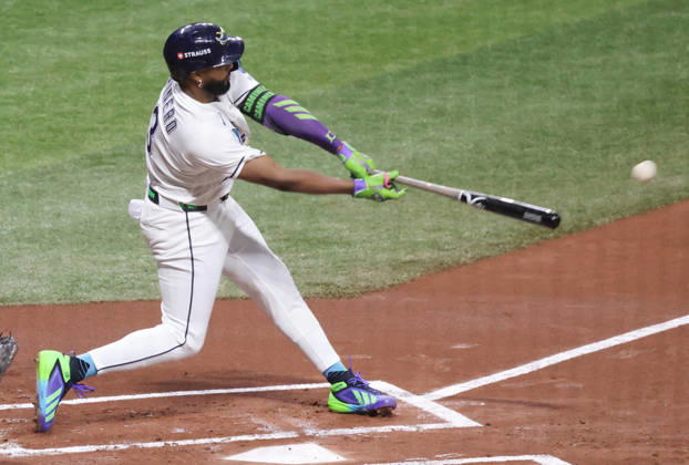 Tampa Bay Ray Junior Caminero (13) hits a double against the Cleveland Guardians in the first inning in game two of the MLB, Baseball Herren, USA American League Championship Series playoffs at Tropicana Field in St Petersburg, Florida, on Tuesday, October 13, 2026.  TPB20261013703 GARYxBOGDON