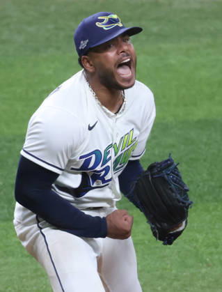 Tampa Bay Rays pitcher Freddy Peralta (51) celebrates after striking out Cleveland Guardians Petey Halpin for the last out in the sixth inning in game two of the MLB, Baseball Herren, USA American League Championship Series playoffs at Tropicana Field in St Petersburg, Florida, on Tuesday, October 13, 2026.  TPB20261013726 GARYxBOGDON