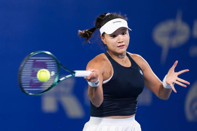 October 14, 2026, Wuhan, Hubei, China: Hanyu Guo of China plays against Katie Volynets of USA ( not in view) during the Wuhan Open final match at the Optics Valley International Tennis Center. Hanyu Guo defeated Katie Volynets with a score of 6-4, 4-6, 7-6. Wuhan China - ZUMAs197 20261014_aaa_s197_091 Copyright: xRenxYongx