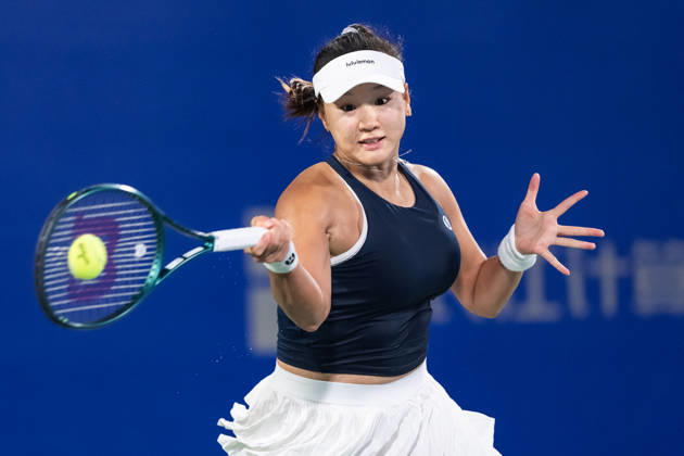 October 14, 2026, Wuhan, Hubei, China: Hanyu Guo of China plays against Katie Volynets of USA ( not in view) during the Wuhan Open final match at the Optics Valley International Tennis Center. Hanyu Guo defeated Katie Volynets with a score of 6-4, 4-6, 7-6. Wuhan China - ZUMAs197 20261014_aaa_s197_093 Copyright: xRenxYongx