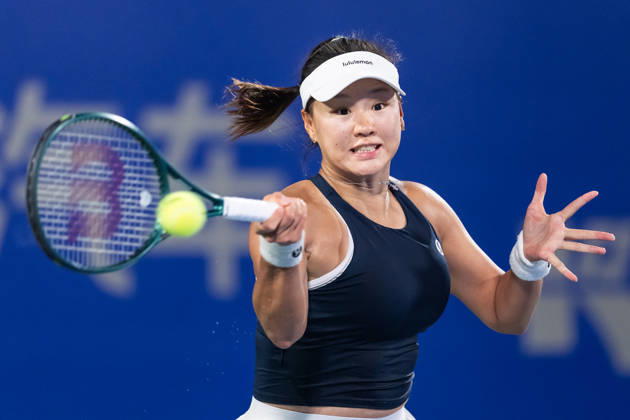 October 14, 2026, Wuhan, Hubei, China: Hanyu Guo of China plays against Katie Volynets of USA ( not in view) during the Wuhan Open final match at the Optics Valley International Tennis Center. Hanyu Guo defeated Katie Volynets with a score of 6-4, 4-6, 7-6. Wuhan China - ZUMAs197 20261014_aaa_s197_094 Copyright: xRenxYongx