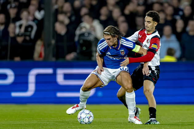 ROTTERDAM: Como midfielder Nicolás Paz and Feyenoord midfielder Oussama Targhalline during the UEFA Champions League match between Feyenoord and Como at De Kuip on October 14, 2026, in Rotterdam, Netherlands. Photo by DeFodi Images