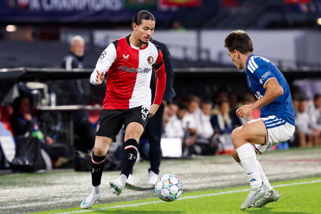 2026-10-14 Feyenoord v Como - UEFA Champions League, league phase, matchday 2 ROTTERDAM, NETHERLANDS - OCTOBER 14: Anis Hadj Moussa of Feyenoord is challenged during the UEFA Champions League, league phase, matchday 2 match between Feyenoord and Como at Stadion Feijenoord on October 14, 2026 in Rotterdam, Netherlands. Rotterdam Stadion Feijenoord Netherlands Content not available for redistribution in The Netherlands directly or indirectly through any third parties. Copyright: xHansxvanxderxValkx