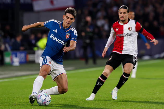 2026-10-14 Feyenoord v Como - UEFA Champions League, league phase, matchday 2 ROTTERDAM, NETHERLANDS - OCTOBER 14: Jacobo Ramon of Como is challenged by Anis Hadj Moussa of Feyenoord during the UEFA Champions League, league phase, matchday 2 match between Feyenoord and Como at Stadion Feijenoord on October 14, 2026 in Rotterdam, Netherlands. Rotterdam Stadion Feijenoord Netherlands Content not available for redistribution in The Netherlands directly or indirectly through any third parties. Copyright: xHansxvanxderxValkx