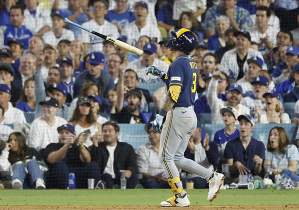 Milwaukee Brewers Joey Ortiz (3) tosses his bat after hitting into a double play against the Los Angeles Dodgers in the seventh inning of the MLB, Baseball Herren, USA National League Championship Series playoffs at Dodger Stadium in Los Angeles, California, on Wednesday, October 14, 2026.  LAP20261014735 CAROLINExBREHMAN