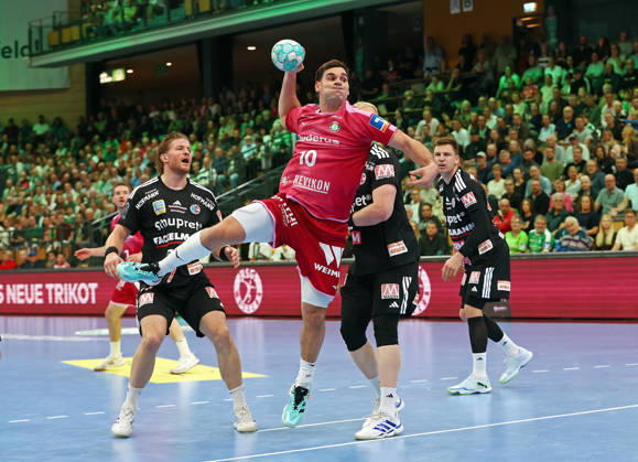 October 15, 2026, xovx, Opel Handball Bundesliga, HSG Wetzlar vs. HC Erlangen: Maciej Gebala (HC Erlangen), Josip Simic (HSG Wetzlar), Sebastian Firnhaber (HC Erlangen), Christoph Steinert (HC Erlangen); Wetzlar, Buderus Arena, Hesse, Germany, DE