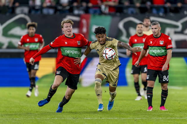 NIJMEGEN l NEC Nijmegen defender Perr Schuurs and Levski Sofia forward Reinaldo during the UEFA Europa League match between NEC and Levski Sofia at Stadion De Goffert on October 15, 2026, in Nijmegen, the Netherlands. Photo by DeFodi Images