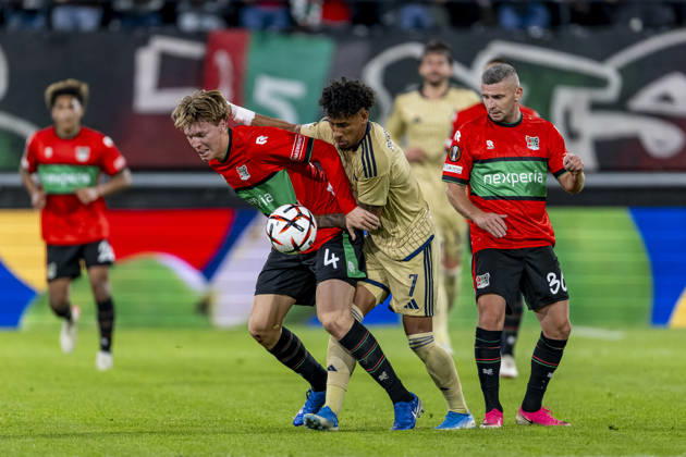 NIJMEGEN l NEC Nijmegen defender Perr Schuurs and Levski Sofia forward Reinaldo during the UEFA Europa League match between NEC and Levski Sofia at Stadion De Goffert on October 15, 2026, in Nijmegen, Netherlands. Photo by DeFodi Images
