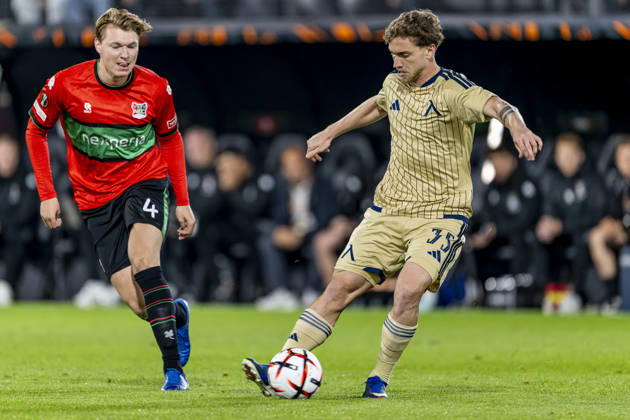 NIJMEGEN l NEC Nijmegen defender Perr Schuurs and Levski Sofia midfielder Serginho during the UEFA Europa League match between NEC and Levski Sofia at Stadion De Goffert on October 15, 2026, in Nijmegen, the Netherlands. Photo by DeFodi Images
