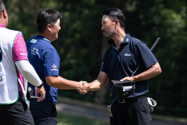 October 16, 2026, Coloane, Macao Sar, China: USAÃ¢â‚¬â ¢s Kevin NA (R) congratulates Sungjae IM (L) from Korea on his round of -7 par bringing him into the lead with -13par. Round 2 in the Macao Open Golf at Macau Golf & Country Club. Coloane China - ZUMAr144 20261016_zap_r144_085 Copyright: xJaynexRussellx
