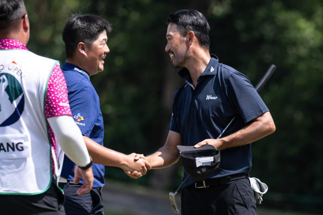 October 16, 2026, Coloane, Macao Sar, China: USAÃ¢â‚¬â ¢s Kevin NA (R) congratulates Sungjae IM (L) from Korea on his round of -7 par bringing him into the lead with -13par. Round 2 in the Macao Open Golf at Macau Golf & Country Club. Macau Open Golf Round 2  - ZUMAr144 20261016_zap_r144_090 Copyright: xJaynexRussellx