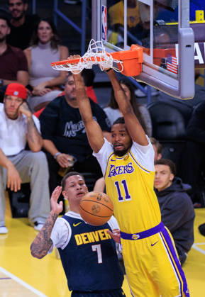 October 16, 2026, Los Angeles, California, USA: Ziaire Williams 11 of the Los Angeles Lakers dunks the ball during a preseason NBA, Basketball Herren, USA game against the Denver Nuggets on Friday October 16, 2026 at Crypto.com Arena in Los Angeles, California. JAVIER ROJAS PI Lakers Vs. Nuggets - Preseason  - ZUMAp124 20261016_zaa_p124_010 Copyright: xJavierxRojasx