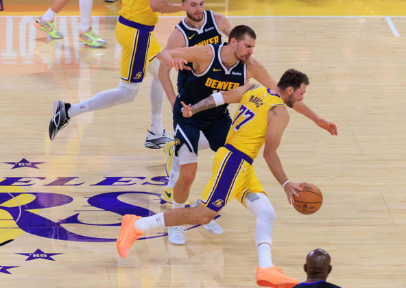 October 16, 2026, Los Angeles, California, USA: Luka Doncic 77 of the Los Angeles Lakers looks to get past Nikola Jokic 15 of the Denver Nuggets during a preseason NBA, Basketball Herren, USA game on Friday, October 16, 2026, at Crypto.com Arena in Los Angeles, California. JAVIER ROJAS PI Lakers Vs. Nuggets - Preseason - ZUMAp124 20261016_zaa_p124_015 Copyright: xJavierxRojasx