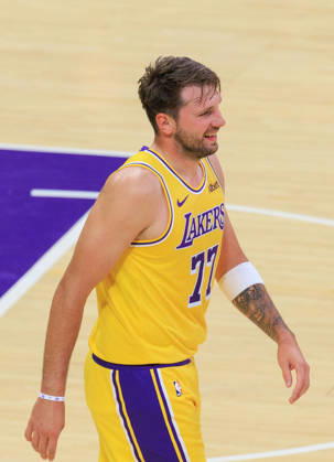 October 16, 2026, Los Angeles, California, USA: Luka Doncic 77 of the Los Angeles Lakers reacts after making his first three-point shot during a preseason NBA, Basketball Herren, USA game against the Denver Nuggets on Friday October 16, 2026 at Crypto.com Arena in Los Angeles, California. Lakers lose to Nuggets, 106-121. JAVIER ROJAS PI Lakers Vs. Nuggets - Preseason  - ZUMAp124 20261016_zaa_p124_049 Copyright: xJavierxRojasx