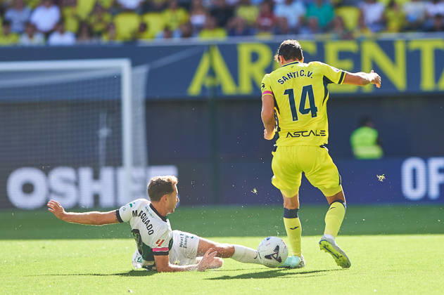 Marc Aguado of Elche CF and Santi Comesana of Villarreal CF during the LaLiga EA Sports match between Villarreal CF and Elche CF at Estadio de la Cerámica on October 17, 2026, in Villarreal, Spain