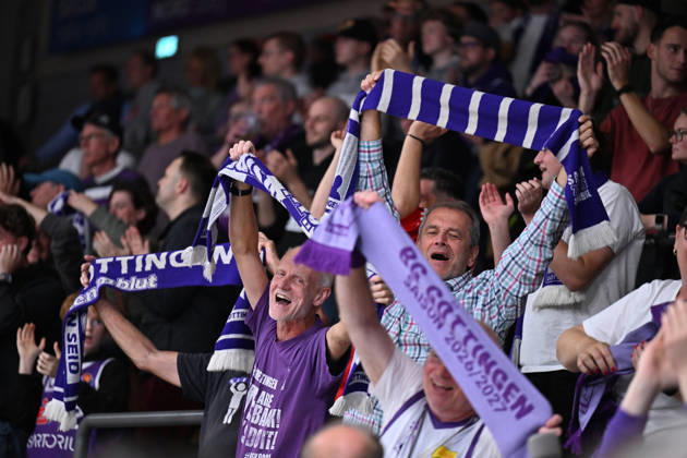 BG Göttingen vs. Nürnberg Falcons, 17–10, 2026, Göttingen Basketball, 2. Bundesliga, ProA, BG Göttingen vs. Nürnberg Falcons, Matchday 5, Sparkassen Arena: Fans cheer and hold up scarves bearing the word GÖTTINGEN ; Göttingen, Lower Saxony, Germany