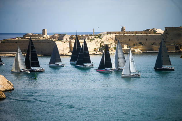 (261018) -- VALLETTA, Oct. 18, 2026 -- Yachts are seen sailing from the Grand Harbour of Malta, port of Valletta, during the 47th Rolex Middle Sea Race in Valletta, Malta, on Oct. 17, 2026. (Photo by Xinhua) (SP)MALTA-VALLETTA-SAILING-ROLEX MIDDLE SEA RACE JonathanxBorg 