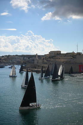 (261018) -- VALLETTA, Oct. 18, 2026 -- Yachts are seen sailing from the Grand Harbour of Malta, port of Valletta, during the 47th Rolex Middle Sea Race in Valletta, Malta, on Oct. 17, 2026. (Photo by Xinhua) (SP)MALTA-VALLETTA-SAILING-ROLEX MIDDLE SEA RACE JonathanxBorg 