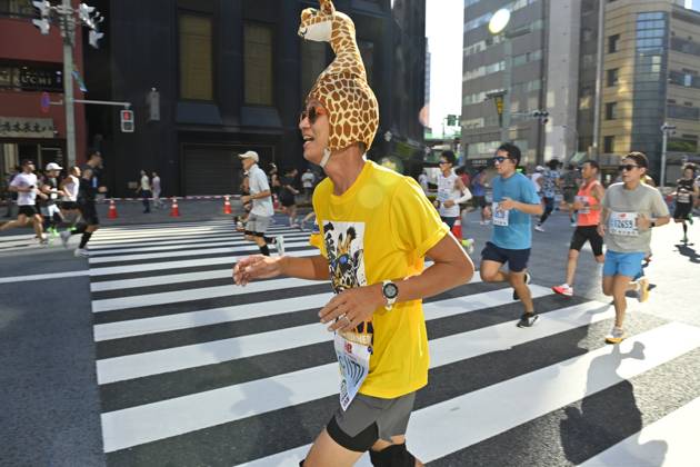Runners take part in Tokyo Half Marathon in Japan TOKYO, JAPAN - OCTOBER 18 : Runners wearing colorful and unusual costumes participate in the Tokyo Half Marathon as they make their way through the Muromachi district in central Tokyo, Japan, October 18, 2026. David Mareuil Anadolu Tokyo Japan. Editorial use only. Please get in touch for any other usage.  Copyright: x2026xAnadoluxDavidxMareuilx