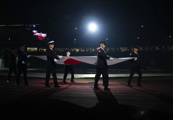 (261018) -- NAGOYA, Oct. 18, 2026 -- The Japanese national flag is carried during the opening ceremony of the Aichi-Nagoya Asian Para Games in Nagoya, Japan, Oct. 18, 2026. ) (SP)JAPAN-NAGOYA-ASIAN PARA GAMES-OPENING CEREMONY JiaxHaocheng 