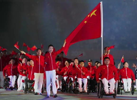 (261018) -- NAGOYA, Oct. 18, 2026 -- The delegation of China parades into the stadium during the opening ceremony of the Aichi-Nagoya Asian Para Games in Nagoya, Japan, Oct. 18, 2026. ) (SP)JAPAN-NAGOYA-ASIAN PARA GAMES-OPENING CEREMONY JiaxHaocheng 
