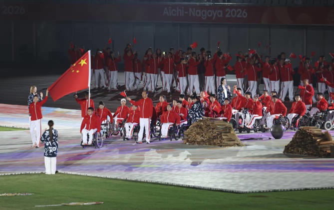 (261018) -- NAGOYA, Oct. 18, 2026 -- The delegation of China parades into the stadium during the opening ceremony of the Aichi-Nagoya Asian Para Games in Nagoya, Japan, Oct. 18, 2026. ) (SP)JAPAN-NAGOYA-ASIAN PARA GAMES-OPENING CEREMONY YaoxQilin