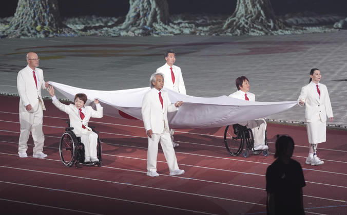 (261018) -- NAGOYA, Oct. 18, 2026 -- The Japanese national flag is carried during the opening ceremony of the Aichi-Nagoya Asian Para Games in Nagoya, Japan, Oct. 18, 2026. ) (SP)JAPAN-NAGOYA-ASIAN PARA GAMES-OPENING CEREMONY CaixYang 