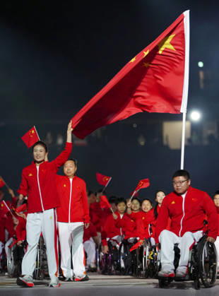 (261018) -- NAGOYA, Oct. 18, 2026 -- The delegation of China parades into the stadium during the opening ceremony of the Aichi-Nagoya Asian Para Games in Nagoya, Japan, Oct. 18, 2026. ) (SP)JAPAN-NAGOYA-ASIAN PARA GAMES-OPENING CEREMONY JiaxHaocheng 