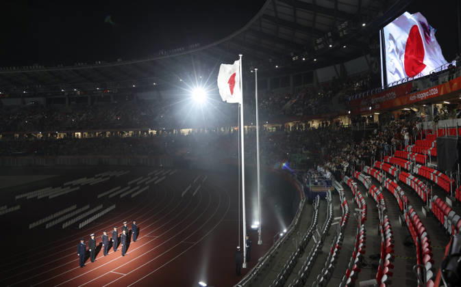 (261018) -- NAGOYA, Oct. 18, 2026 -- The Japanese national flag is raised during the opening ceremony of the Aichi-Nagoya Asian Para Games in Nagoya, Japan, Oct. 18, 2026. ) (SP)JAPAN-NAGOYA-ASIAN PARA GAMES-OPENING CEREMONY YaoxQilin 
